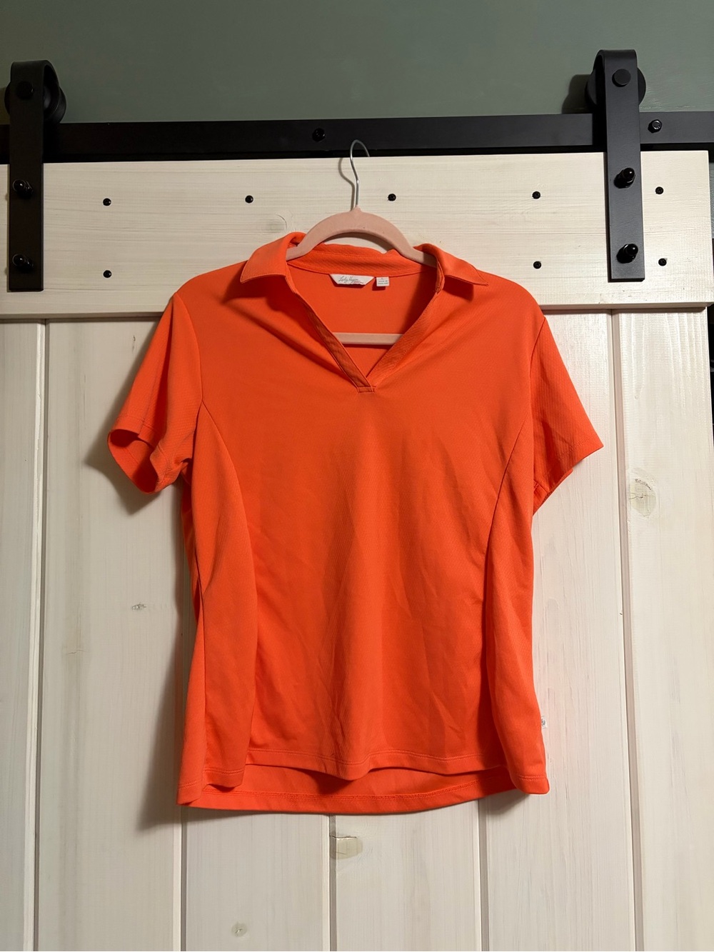 Orange golf polo